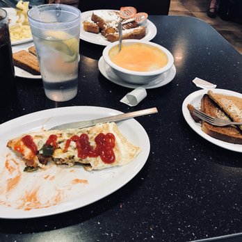 Joe's Cafe - My partially eaten western omelet with egg whites, wheat toast, and cheese grits. - American Near Me - Sterling, Virginia