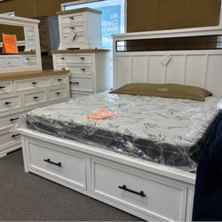 Furniture & Cabinet Outlet - White bedroom set with bed, dresser, and mirror at Furniture & Cabinet Outlet in West Chester Township, Ohio.