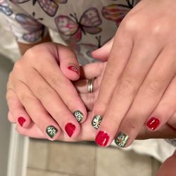 Signature Nails Spa - Took my Ella to get her nails done & Boyy did they deliver!! Look how cute her X-mas nails are !! Will definitely be coming back