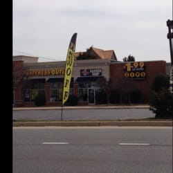 Next to Zips and Mattress Outlet near the chickFila on Rte 3