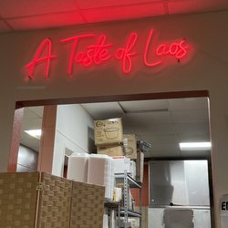 A Taste Of Laos - Signage above kitchen doorway