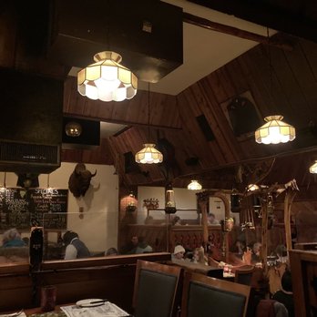 Grizzly House - Looking out from our dark corner toward the better-lit parts of the restaurant - Fondue Near Me - Banff, Alberta
