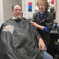 Brookings Barbers - Linda with another satisfied customer!