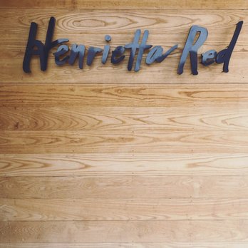 Henrietta Red - Photo op outside main entrance - New American Near Me - Nashville, Tennessee