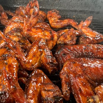 Just Grillin BBQ - a closeup of a bbq with chicken wings - Barbeque Near Me - Stone Mountain, Georgia Just Grillin BBQ - a closeup of a bbq with chicken wings - Barbeque Near Me - Stone Mountain, Georgia