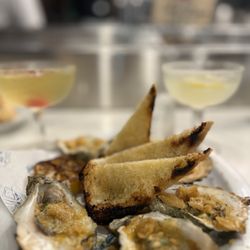 Water Street Oyster Bar - Wood grilled oysters