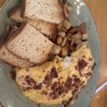 T.C. Eggington's - Bacon, egg, and cheese omelette with gluten free toast and house potatoes. - Breakfast & Brunch Near Me - Mesa, Arizona