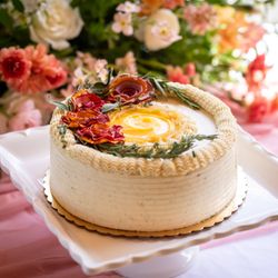 OWL Bakery - Brown butter vanilla base, lemon curd filling, & rosemary swiss meringue buttercream