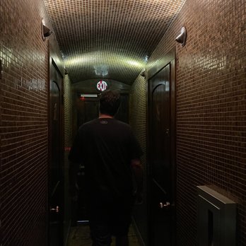 The W - The bathroom hall/hall - Cocktail Bars Near Me - Lee's Summit, Missouri