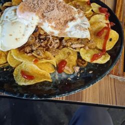 La Española - Foie gras & mushroom eggs on potato chips. I was expecting patatas, didnt read menu carefully. Tinto de veranda are delicious.