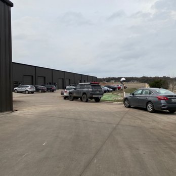 Desert Door - Parking lot in the back of the building. - Distilleries Near Me - Driftwood, Texas Desert Door - Parking lot in the back of the building. - Distilleries Near Me - Driftwood, Texas