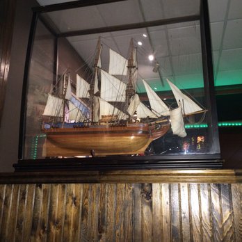 Marie's Cafe - a model of a ship in a glass case - Seafood Near Me - McGill, Nevada