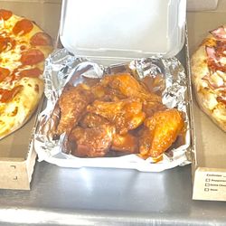 Roma's Pizza - Tow X-large 16" pizzas w/cheese & 2 toppings on each and 12pc buffalo wings for $48.
