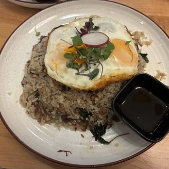 NAM Kitchen - Gardena - Oxtail Fried Rice (8-hour braised oxtail with basil, scallion, fish sauce and two sunny-side-up eggs on top, served with a house soy sauce) - Asian Fusion Near Me - Gardena, California NAM Kitchen - Gardena - Oxtail Fried Rice (8-hour braised oxtail with basil, scallion, fish sauce and two sunny-side-up eggs on top, served with a house soy sauce) - Asian Fusion Near Me - Gardena, California