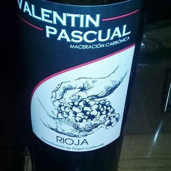 Bodegas Valentín Pascual - The red wine.  The hands of the father and son around the grapes. - Wine Tasting Room Near Me - Cenicero, LO