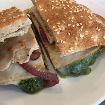 Rosebud Cafe - Delicious hot turkey sandwich. Fresh pesto, red onion, tomato, provolone, tomato, and turkey on flatbread. - Cafes Near Me - Denver, Colorado Rosebud Cafe - Delicious hot turkey sandwich. Fresh pesto, red onion, tomato, provolone, tomato, and turkey on flatbread. - Cafes Near Me - Denver, Colorado