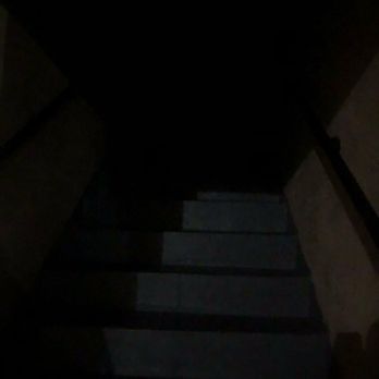 Mediterranean Apartments - Dark stairway to apartment - Apartments Near Me - Whittier, California Mediterranean Apartments - Dark stairway to apartment - Apartments Near Me - Whittier, California