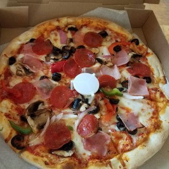 Mediterraneo Pizza - The Works ham, pepperoni, mushrooms olives peppers onions. Really good and well made - Pizza Near Me - New York, New York