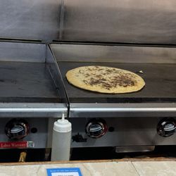 La Pupusa Loca Grille - The famous pupusa Loca. It's about 12 inches.