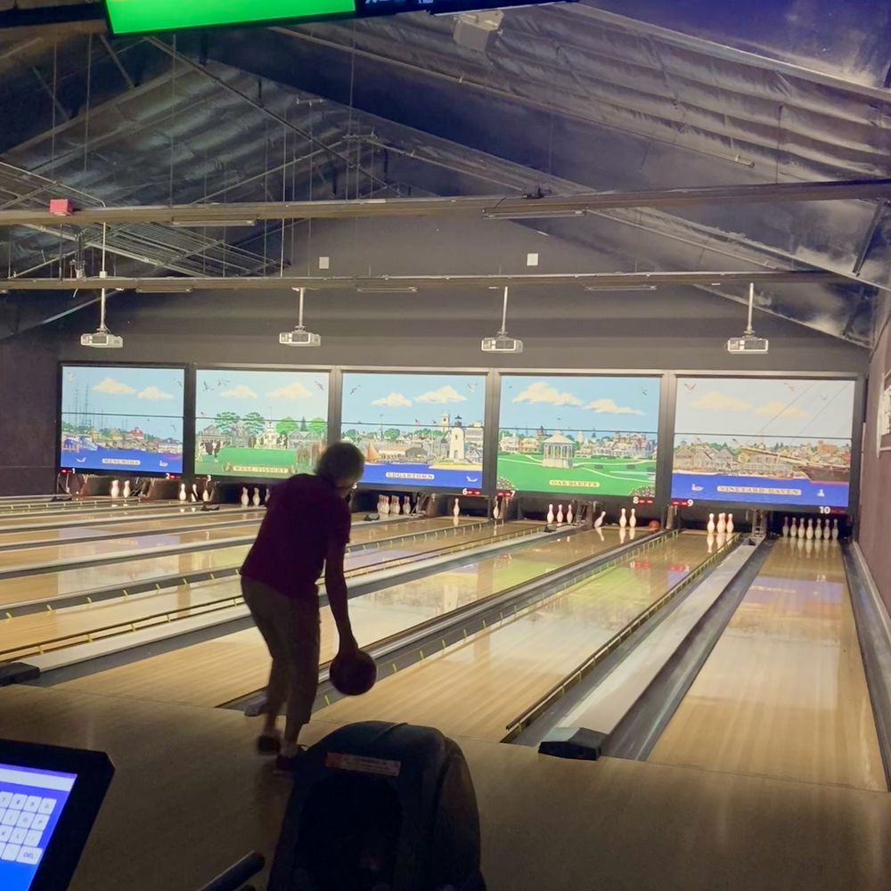 The Barn Bowl & Bistro - The ten lanes are grouped in twos under five MV city posters. - Bowling Near Me - Oak Bluffs, Massachusetts The Barn Bowl & Bistro - The ten lanes are grouped in twos under five MV city posters. - Bowling Near Me - Oak Bluffs, Massachusetts