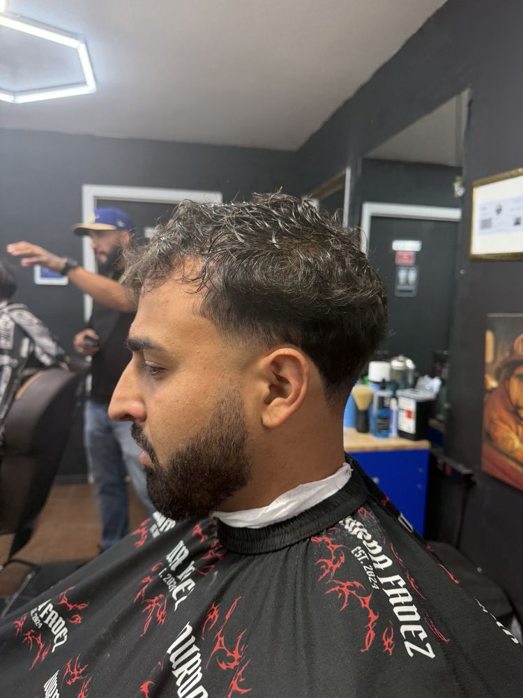 Xtra Barbershop Logo