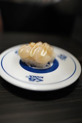 Kura Revolving Sushi Bar by null