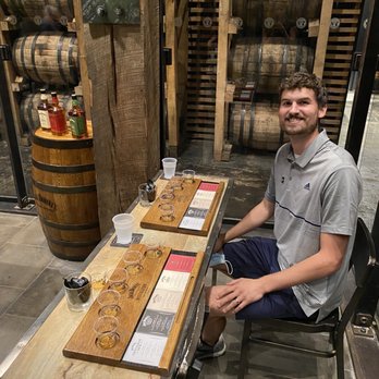 The Jack Daniel Distillery - Sitting down for the tasting. Awesome set-up. - Distilleries Near Me - Lynchburg, Tennessee