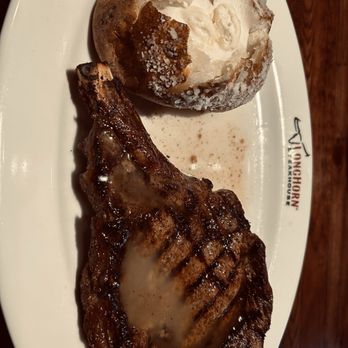LongHorn Steakhouse - Outlaw ribeye with super salty potato with little butter - Steakhouses Near Me - Manor, Texas