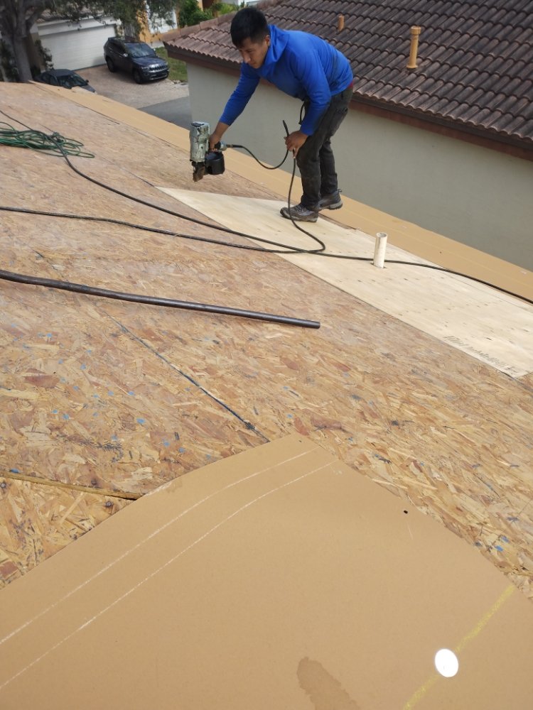 Slide of Carlos Roofing