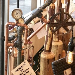 Statewide Lighting - A variety of price points on the Joey Vega steam punk art at Statewide Lighting.