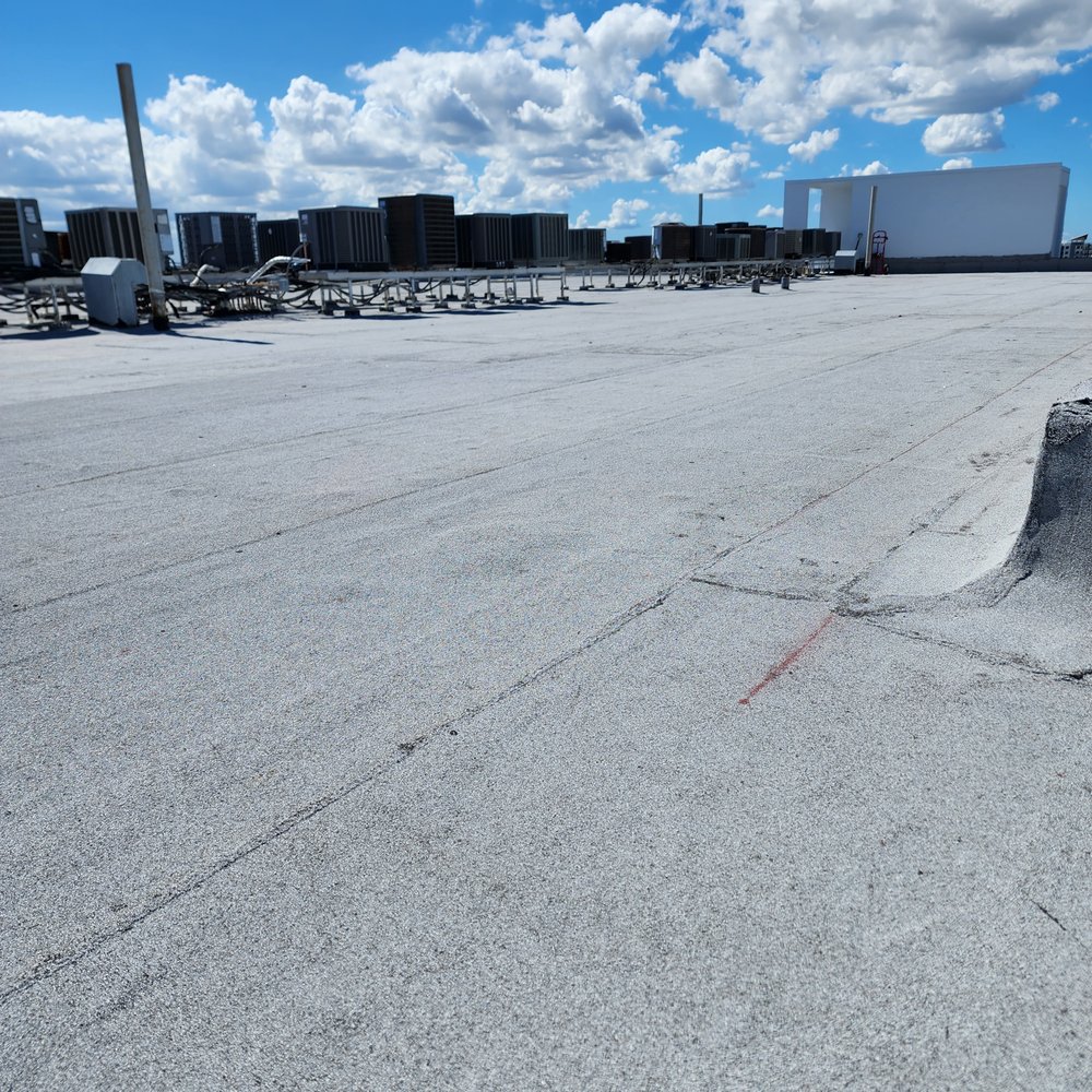 Slide of Dan Tennis Roofing