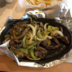 El Castillo - Steak fajitas on a sizzling plate