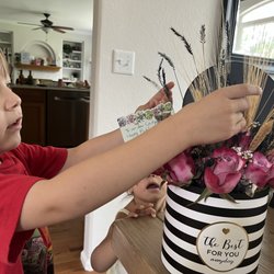Your Flower Stop - Our two grandchildren checking out mom's arrangement!  They loved it too.