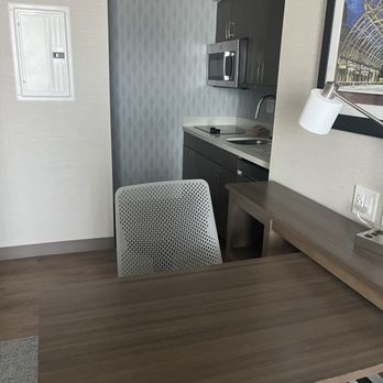 Homewood Suites by Hilton Reston - Desk/table and kitchen area - Hotels Near Me - Reston, Virginia Homewood Suites by Hilton Reston - Desk/table and kitchen area - Hotels Near Me - Reston, Virginia