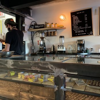 Fine & Raw Chocolate Factory - a man working behind the counter - Desserts Near Me - Brooklyn, New York
