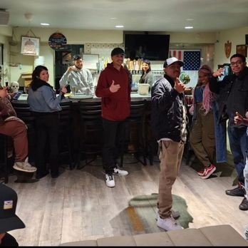 Hola Habibi - a group of people standing around a bar - Beer Bar Near Me - Las Vegas, Nevada Hola Habibi - a group of people standing around a bar - Beer Bar Near Me - Las Vegas, Nevada