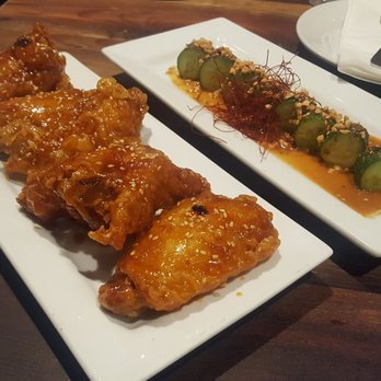DOMU - Extra Crispy Domu Wings. You don't have to order them that way, they just come perfect. Sichuan cucumbers pair perfectly. - Ramen Near Me - Orlando, Florida
