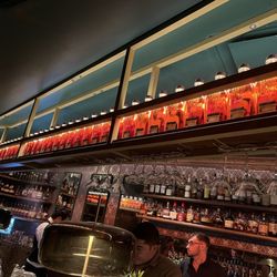 Bruno - Barreled Elijah Craig bourbon on top shelf
