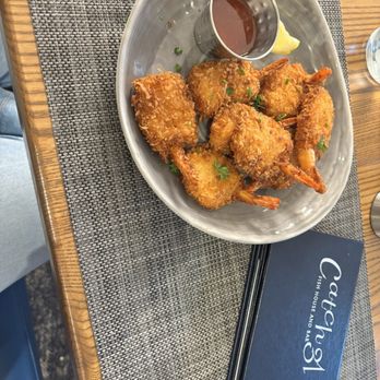 Catch 31 Fishhouse and Bar - Coconut shrimp appetizer - Bars Near Me - Virginia Beach, Virginia Catch 31 Fishhouse and Bar - Coconut shrimp appetizer - Bars Near Me - Virginia Beach, Virginia
