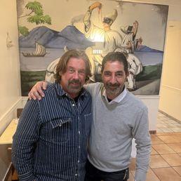 My husband with Armando with the beautiful panting behind My husband with Armando with the beautiful panting behind