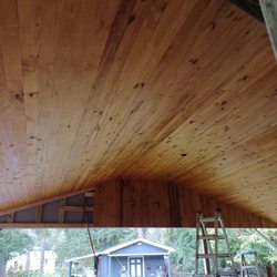 Lowe's Home Improvement - A pic of the inside of our roof we are putting over our patio. We needed 1 more board to stain and nail up.