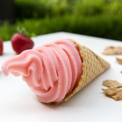 La Creme Frozen Yogurt - Strawberry Frozen Yogurt in a waffle cone