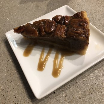 Frozen Pirogue - Hot Pecan pie with rum sauce. - Cajun/Creole Near Me - Bossier City, Louisiana Frozen Pirogue - Hot Pecan pie with rum sauce. - Cajun/Creole Near Me - Bossier City, Louisiana