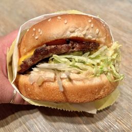 Cheeseburger. The grilled beef patty is slightly charred on the outside while remaining juicy inside. I'm a fan and highly recommend. Cheeseburger. The grilled beef patty is slightly charred on the outside while remaining juicy inside. I'm a fan and highly recommend.