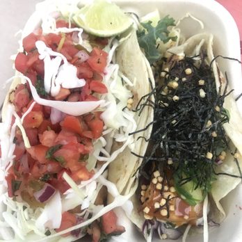 Tacofino - Fish taco on the left and tuna taco on the right. - Mexican Near Me - Vancouver, British Columbia Tacofino - Fish taco on the left and tuna taco on the right. - Mexican Near Me - Vancouver, British Columbia