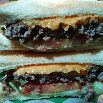 Broad Street Cafe - Homemade Bart burger cut in half - Cafes Near Me - Saint Pauls, North Carolina