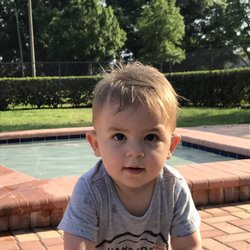 His first haircut! We didn't blow dry it at the salon since he was already not having it. We love how it looks!