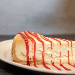 Brooklyn Bar and Grill - New York Cheese Cake with Raspberry Drizzle