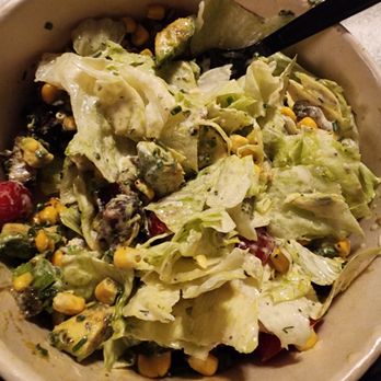 Yardbird Table & Bar - Iceberg lettuce with an already generous portion of dressing - Southern Near Me - Miami Beach, Florida