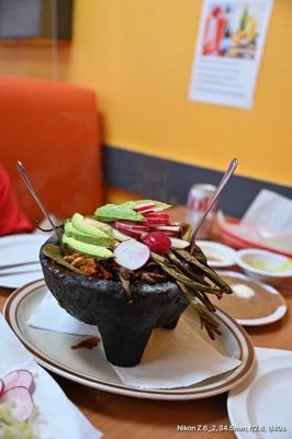 Photo of Carnitas Sahuayo Restaurant - Santa Ana, CA, US. Meat Molcajete